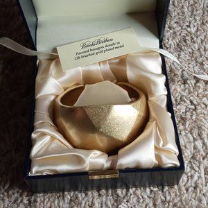 Very unique, 12K brushed gold plated metal bracelet.